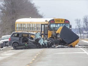 The driver of a minivan is dead after in a head-on collision with a school bus on McNaught Line, between St. Michaels and Cranbrook roads, southwest of Listowel. at about 7:30 a.m. on Tuesday, Dec. 15, 2020. The bus driver received minor injuries. No other people were in either vehicles. (Derek Ruttan/The London Free Press)