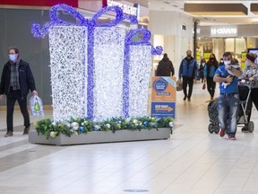 With one week left before the big day, holiday shoppers were searching for the perfect gifts at White Oaks Mall in London, Ont. (Derek Ruttan/The London Free Press)