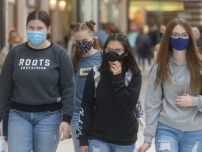 Teen girls on a mission, four Woodstock teens were busy at White Oaks Mall getting some shopping done. From left, Faith Carruthers, Ruthie Rennie, Kate Power and Rebekah Barrett all of Woodstock were enjoying the days shopping in London. Photograph taken on Sunday November 29, 2020. (Mike Hensen/The London Free Press)