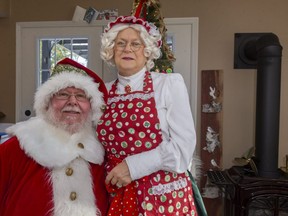 Bill and Margaret Nadalin of Sweaburg cancelled their in-person appearances this year as Santa and Mrs. Claus because of the COVID-19 pandemic. They post stories on Facebook and book virtual meetings with kids. (Mike Hensen/The London Free Press)