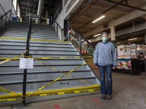 The Western Fair Market has closed its upper floor that includes non-essential vendors. Food vendor Edna Lorimer said, "It's unfair that we had to close unessentials upstairs while big box stores have non-essentials and they can stay open."  (Mike Hensen/The London Free Press)