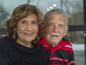 Genia Carter poses with her husband Bryan at their home in London, Ont., on Monday, Dec. 28, 2020. Genia Carter and her 11 siblings captured the Guinness world record for the highest combined age of 12 living siblings on Dec. 15, when their collective age hit 1,042 years, 315 days. (Mike Hensen/The London Free Press)