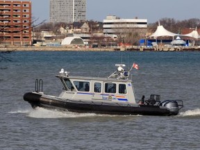 The RCMP marine unit powers downstream on the Detroit River in this Dec. 3 file photo.
