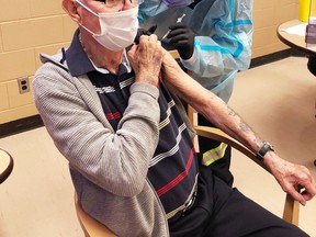 Tavistock’s Earl Morrison, a resident at PeopleCare, received his first-dose of the Pfizer-BioNTech COVID-19 vaccine at the home on Tuesday. Morrison was one of the first long-term care home residents in the Southwestern public health region to receive the vaccine. (Courtesy of PeopleCare Tavistock)