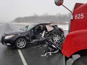 Highway 401 eastbound was closed Tuesday afternoon, between Elgin and Putnam roads, after a crash that seriously injured two people. (OPP West Region/Twitter)
