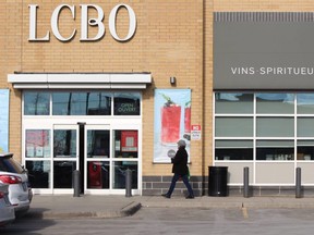 Two London men face charges after a gun was fired during a robbery at the LCBO at 681 Wonderland Rd. on Tuesday night. Nobody was injured. (DALE CARRUTHERS, The London Free Press)