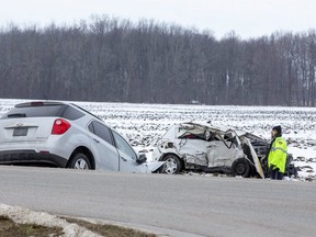 One person was killed and two people were taken to hospital after a collision between two vehicles at the intersection of Adelaide Street and Ilderton Road just north of London, Ont. on Wednesday January 6, 2021. (Derek Ruttan/The London Free Press)