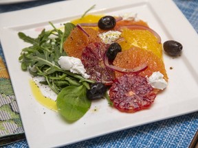 Navel, Cara Cara and blood oranges add colour and tang to this easy, tasty citrus salad with black olives and goat's cheese, Jill Wilcox says. (Derek Ruttan/The London Free Press)
