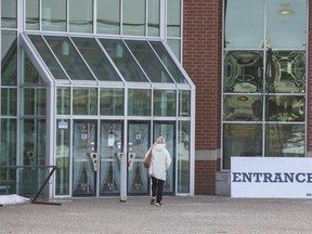 A person enters Western Fair Agriplex. (Derek Ruttan/The London Free Press)