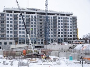 An apartment building is being constructed in the Sunninglea subdivision at Sunningdale and Callaway roads. Newly finished apartment buildings have helped bring London's apartment vacancy rate down to an eight-year low. (Derek Ruttan/The London Free Press)