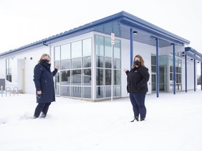 Thames Centre mayor Alison Warwick (left) and deputy mayor Kelly Elliot stand in front of the new Thorndale Community Centre in Thorndale on Friday January 29, 2021. February marks one year since a fire destroyed the old one, which was a community landmark. Derek Ruttan/The London Free Press