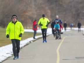 Rob Bearss, of London, runs through Greenway Park on a mild Sunday January 10, 2021.  Bearss says he used to run a lot but stopped, and then last May started up, "mainly due to COVID, have to do something to stay in shape." (Mike Hensen/The London Free Press)