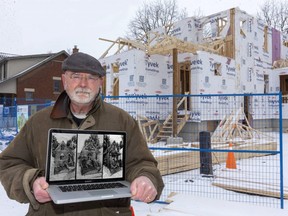 Richard Thompson, a London artist has given three drawings of homes destroyed by the blast on Woodman Avenue to the homeowners in London, Ont. 
(MIKE HENSEN, The London Free Press)