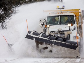 Steve Presswood of Thames Centre shows just why it's so dangerous to try and pass a snowplow. (Mike Hensen/The London Free Press)