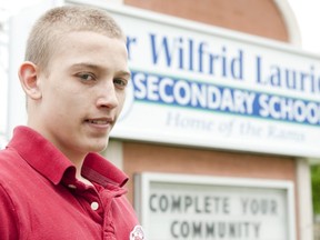 Mitchell DeActis, 17, stands outside of Sir Wilfrid Laurier Secondary School in London.  DeActis is the 2011 winner of the McTavish Award, dedicated to the memories of Ernie and Ted McTavish, which rewards students who overcome significant challenges in achieving their education.  (File photo)