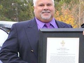 Retired OPP Sgt. Larry Renton, who was presented with a lifetime achievement award from the force in 2015, is the subject of a police probe over financial irregularities.