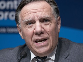 Quebec Premier Francois Legault responds to a question during a news conference in Montreal, on Wednesday, January 6, 2021.