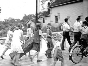 Could Southwestern Ontario's small towns, losing population for years, start booming again post-pandemic? One local community, Arkona, is shown here on May 8, 1945 as crowds gathered outside to celebrate Victory In Europe Day. Photo courtesy of the Lambton County Archives.