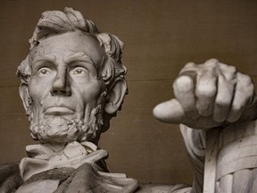 The statue of U.S. President Abraham Lincoln sits in the main chamber of the Lincoln Memorial in Washington, DC.