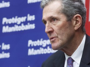 Premier Brian Pallister holds a COVID-19 update at the Manitoba Legislative building Wednesday, where among other things he said that Manitoba schools would not be available as polling stations if the federal government decided to hold a spring election. (MIKE DEAL/Postmedia Network)