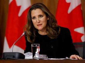 Deputy Prime Minister and Minister of Finance Chrystia Freeland speaks to news media before unveiling her first fiscal update, the Fall Economic Statement 2020, in Ottawa, Nov. 30, 2020.