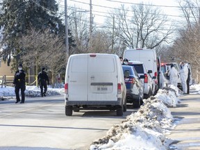 Members of the London police major crime unit are investigating the discovery Wednesday of a dead body in a home on Stanley Street. No information about the deceased individual was released.   (Derek Ruttan/The London Free Press)