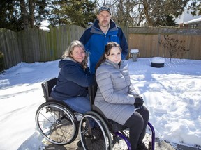 Lisa and Shawn Bradley are having True North Tiny Homes build a small house in their backyard for their daughter Stephanie Breidinger, right. (Derek Ruttan/The London Free Press)