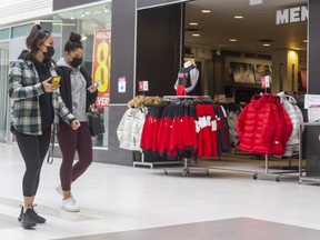 Ivy Blackburn and Olivia Hatchett of London stroll through a newly reopened White Oaks Mall in mid-February.
(Mike Hensen/The London Free Press)