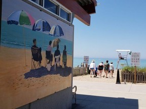 The Beach House Mural Project in Grand Bend, launched in 2018, is swapping out the artwork on the main beach pavilion for the first time this year with new pieces. (Photo taken in 2018, supplied by Teresa Marie).