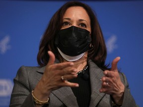 U.S. Vice President Kamala Harris wore two masks when she got her second dose of the Moderna vaccine at the National Institutes of Health in Bethesda, Maryland, U.S. Jan. 26, 2021.
