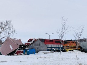 The Transportation Safety Board is investigating a train derailment Monday near the Parrish and Heimbecker grain elevators at the harbour in Goderich that destroyed a historic fish shanty and damaged a transport truck. No one was injured. Kathleen Smith/Postmedia News