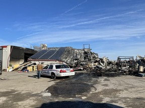 A London police cruiser was at the scene Tuesday morning, one day after a fire at the Flying M truck stop on Colonel Talbot Road. JONATHAN JUHA/The London Free Press