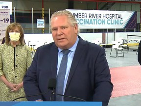 Premier Doug Ford speaks Tuesday, March 30, 2021 during an online news conference. Listening were Health Minister Christine Elliott and vaccine task force chair Gen. (Ret.) Rick Hillier, whose final day with the group is Wednesday. YouTube/The Intelligencer/Postmedia Network