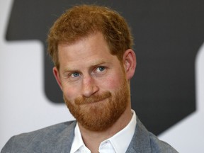 (FILES) In this file photo taken on April 03, 2019 Britain's Prince Harry, Duke of Sussex smiles during a discussion, while on a visit to YMCA South Ealing in west London to learn more about their work on mental health and see how they are providing support to young people in the area. - Britain's Prince Harry announced on April 10, 2019, that he is teaming up with US celebrity talk show host Oprah Winfrey on a documentary series for Apple about mental health. The Duke of Sussex, who is set to become a father this month, will jointly create and executive produce the upcoming mental health-themed show with Winfrey, according to Kensington Palace, his official residence. (Photo by Adrian DENNIS / POOL / AFP)ADRIAN DENNIS/AFP/Getty Images