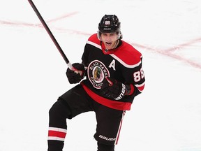 Patrick Kane of the Chicago Blackhawks celebrates his 400th NHL career goal Sunday in a game against the Detroit Red Wings at the United Center in Chicago. (Photo by Jonathan Daniel/Getty Images)