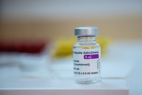 This photograph shows a vial of the AstraZeneca anti-covid-19 vaccine in a pharmacy in Paris on March 12, 2021, as pharmacies have been authorised to give Covid-19 vaccinations - for the first time in the vaccination campaign in France. (Photo by Martin BUREAU / AFP) (Photo by MARTIN BUREAU/AFP via Getty Images)
