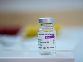 This photograph shows a vial of the AstraZeneca anti-covid-19 vaccine in a pharmacy in Paris on March 12, 2021, as pharmacies have been authorised to give Covid-19 vaccinations - for the first time in the vaccination campaign in France. (Photo by Martin BUREAU / AFP) (Photo by MARTIN BUREAU/AFP via Getty Images)