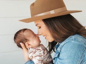 London singer-songwriter Genevieve Fisher has a new baby, Harrison, and a new song climbing the charts, Playing Favourites. (Carmelina Manganaro photo)
