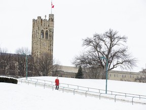 A person strolls through the Western University campus. Photo taken on Feb. 12, 2021. (Derek Ruttan/The London Free Press)