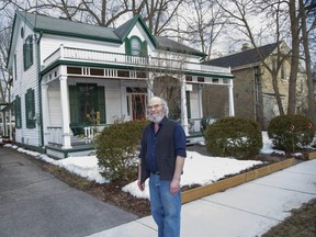 Andrew Nelson stands outside his home at 22 Peter St. in the Woodfield neighbourhood Monday, March 8, 2021. Nelson's home now bears an historical house plaque, the 300th such plaque researched by the  London branch of Architectural Conservancy Ontario as "a reminder of the city’s rich stock of historical homes."  (Derek Ruttan/The London Free Press)