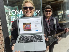 Gord Prior and Boris Novosel of the band Blu Bones show an online link Wednesday, March 17, 2021 to their pop rock song, She's Got A Way With Love, which is being offered with a video for sale on a new platform for selling digitized art, called NFT. (Mike Hensen/The London Free Press)