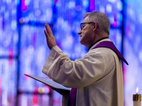 Father Bob Remark of Holy Family Catholic Church in London. (Mike Hensen/The London Free Press)