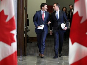 Prime Minister Justin Trudeau and Finance Minister Bill Morneau are seen in Ottawa March 19, 2019. (PHOTO BY CHRIS WATTIE/FILE PHOTO /REUTERS)