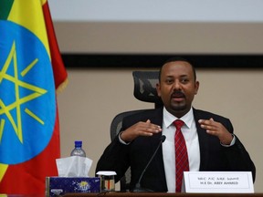 Ethiopia's Prime Minister Abiy Ahmed speaks during a question and answer session with lawmakers in Addis Ababa, Ethiopia, November 30, 2020. (REUTERS/Tiksa Negeri/File Photo)