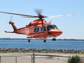 An Ornge helicopter air ambulance takes off from the helicopter pad at the Kingston Health Sciences Centre.