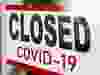 Closed due to COVID sign.