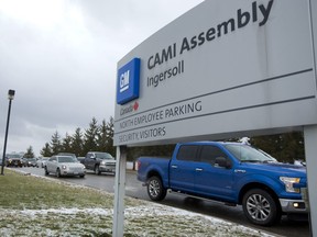 GM workers stream out of the CAMI plant in Ingersoll, Ont., in a file photo taken on Jan. 27, 2017.
