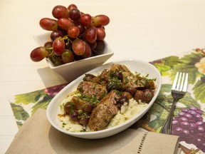 The unlikely Italian dish, combining sausages and grapes with a splash of vinegar, is a tasty way to step outside your culinary comfort zone, Jill Wilcox says. (Derek Ruttan/The London Free Press)