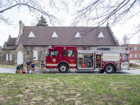 London police and the London fire department investigate a suspicious fire Thursday in the historic Chapel of Hope on the grounds of the former London psychiatric hospital on Highbury Avenue. Photograph taken Thursday, April 8, 2021. Derek Ruttan/The London Free Press