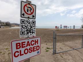 Port Stanley's main beach was open, but the little beach was closed with taped-off port-o-potties helping to drive the point home. Photograph taken on Sunday April 18, 2021. (Mike Hensen/The London Free Press)